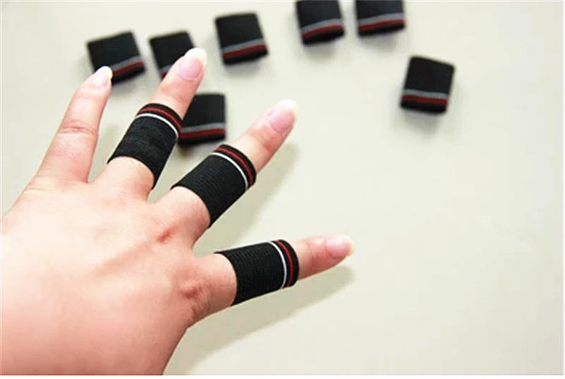 10-Pcs-2015-New-Free-Shipping-Badminton-Basketball-Finger-Guard--Skid-Elastic-Retaining-Finger-Finge-32317909621